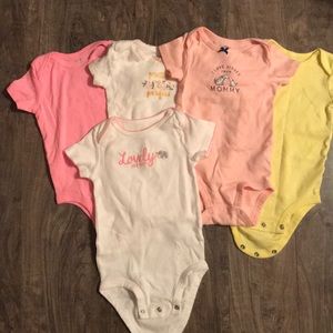 Carters onesies. 9 months. Girls..